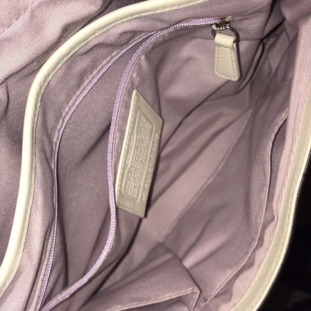 Coach purse with belt clasp